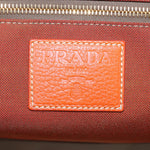 Prada -- Orange Canvas Travel Bag (Pre-Owned)