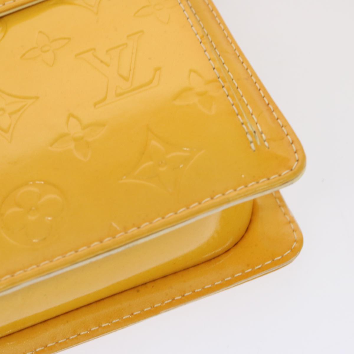 Louis Vuitton Mott Yellow Patent Leather Clutch Bag (Pre-Owned)