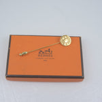 Hermès Sellier Gold Gold Plated Brooch Jewelry (Pre-Owned)